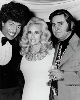 Prints of CIRCA 1972: Musician Little Richard poses with married country couple Tammy Wynette and George Jones in circa 1972. (Photo by Michael Ochs Archives/Getty Images) The Architect of Rock: Little Richard With Country Star Couple