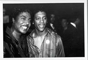 Prints of NEW YORK - 1985: Musician Little Richard poses for a portrait with a friend in 1985 in New York, New York. (Photo by Michael Ochs Archives/Getty Images) The Architect of Rock: Little Richard And Friend