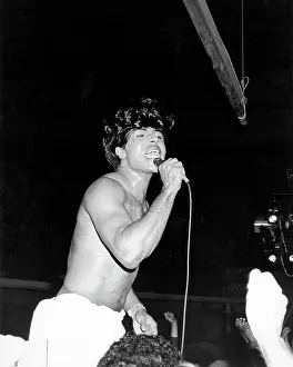 Prints of CIRCA 1957: Musician Little Richard performs onstage with his band and a saxophone player stands on the piano in circa 1957. (Photo by Michael Ochs Archives/Getty Images) The Architect of Rock: Little Richard Performing