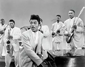 Prints of CIRCA 1956: Musician Little Richard performs onstage in circa 1956. (Photo by Michael Ochs Archives/Getty Images) The Architect of Rock: Little Richard Performing With His Band