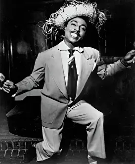 Prints of CIRCA 1955: Musician Little Richard poses for a portrait wearing a straw hat in circa 1955. (Photo by Michael Ochs Archives/Getty Images) The Architect of Rock: Little Richard Porrtait In Straw Hat For Peacock Records