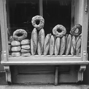 Loaves of bread in store window