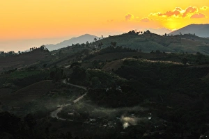 Images Dated 26th December 2010: The local road over Phu Chi Fah mountain