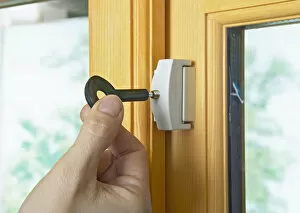 Horizontal Image Gallery: Locking casement window lock with the key