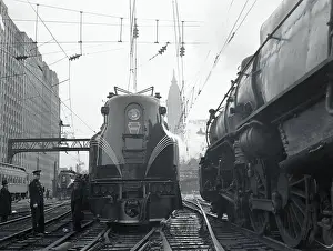 Penn Station: Echoes of Transit: Locomotive Pulling Into Station