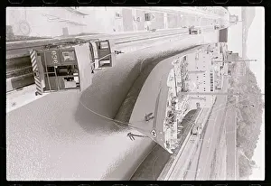 Panama Prints: Locomotives Pulling a Ship Through Canal Locks