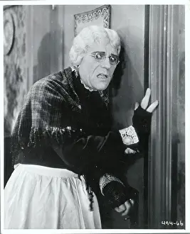 Lon Chaney Wearing Feminine Clothes in Movie Scene