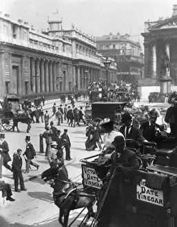 Prints of circa 1895: Traffic and pedestrians bustle around Bank Underground Station in Throgmorton Street, London. The Bank of England on the left. (Photo by F J Mortimer/Getty Images) Francis James Mortimer (1874-1944) Prints: London Traffic