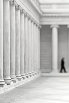 Images Dated 8th March 2008: Lone figure in a colonnade, defocus