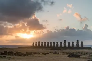 Lone monolithic giant stone Moai statue looking out to sea at Tongariki, Rapa Nui (Easter Island), UNESCO World Heritage Site, Chile, South America