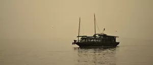 A lone vessel on Ha Long Bay