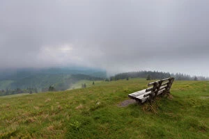 Clouds Collection: Lonely bench on Herzogenhorn mountain, clouds, southern Black Forest, Baden-Wuerttemberg, Germany