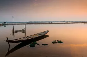 Images Dated 28th April 2015: Lonely boat in lagoon / river landscape
