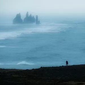 Images Dated 19th March 2015: A lonely man and the unique rock of Vik, Iceland