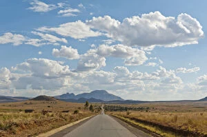 Images Dated 21st May 2013: Long straight road, vast arid landscape, sky with clouds, Isalo National Park near Ranohira
