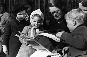 Families Prints: Looking At Magazine