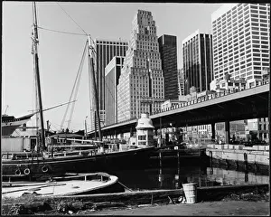 Prints of View looking south from Pier 17, at the South Street Seaport, New York, New York, circa 1975. The Titanic Memorial Lighthouse is visible in the foreground A Visual Journey Through the Legacy of the World’s Most Infamous Ship: Looking South From Pier 17, South Street Seaport
