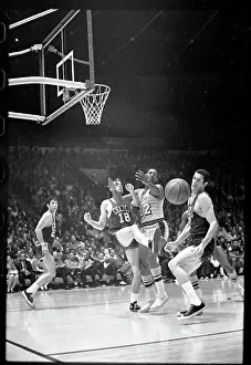 Loose Ball Eludes Elgin Baylor and Other Players