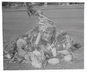 Pomona Prints: Loretta Kaiser Posing with Vegetables