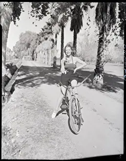 Bicycling Prints: Loretta Young Bicycling in Palm Springs