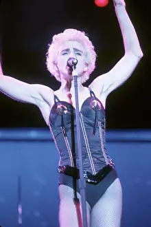 Prints of LOS ANGELES - AUGUST 6: Pop singer Madonna performs onstage in a black bustier with lingerie on on August 6, 1987 in Los Angeles, California. (Photo by Michael Ochs Archives/Getty Images) Experience the Evolution of the Queen of Pop: Los Angeles Concert