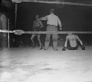 Lou Ambers on the Turf in Boxing Action with Henry Armstrong