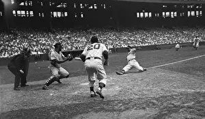 Fast Prints: Lou Boudreau in Compelling Baseball Action
