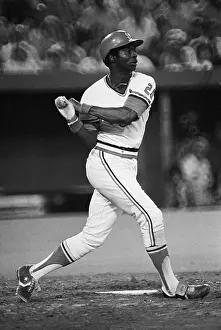 Batting Helmet Prints: Lou Brock Swinging Baseball Bat