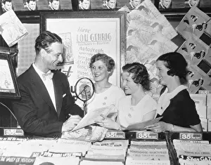 Adoration Prints: Lou Gehrig Autographing Copies of Record by Wife