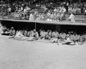 Lou Gehrig and Babe Ruth Sitting Among Others in Dugout