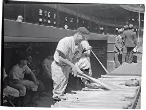 Lou Gehrig Picking Up Bats
