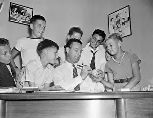 Lou Gehrig Signing Baseball for Boy