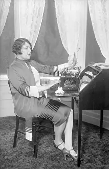 Typewriter Prints: Louella Parsons Seated at Typewriter