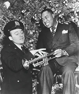 Louis Armstrong and Bing Crosby in the movie Dr. Rhythm