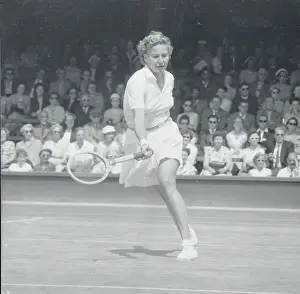 Wimbledon Prints: Louis Brough Swinging Tennis Racquet