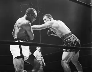Hitting Prints: Louis Hitting Walcott During Fight