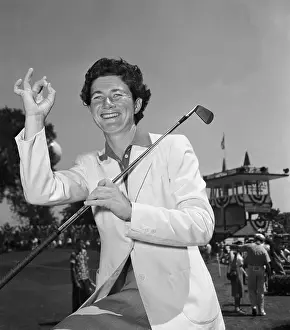 Louise Suggs Posing with Golf Club