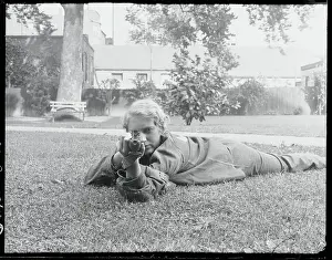 Louise Tittman Aiming Her Rifle