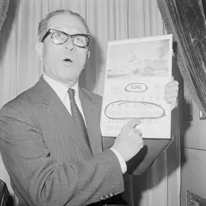 Louisiana Senator Allen J. Ellender Holding a Calendar