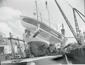 Lowering the Superfoil into the Water