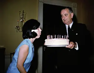 Luci Baines Johnson Blowing out Candles