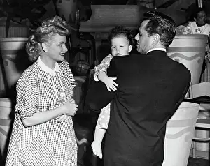 Lucille Ball, Desi Arnaz Holding Baby