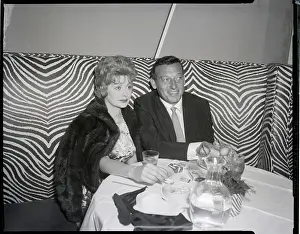 Comedienne Prints: Lucille Ball and Gary Morton Seated in Club