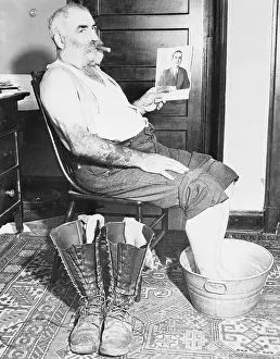 Missing Prints: Lucky Blackiet Holding Picture of Man