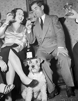 Lucky Luciano Drinking with Woman at House Party