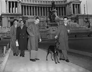 Lucky Luciano Walking with Doberman Pincer