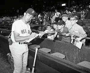 Autographing Prints: Luis Aparicio Signing Autographs