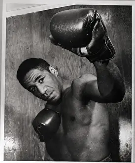 Luis Rodriguez Poses with Gloved Hand in Air