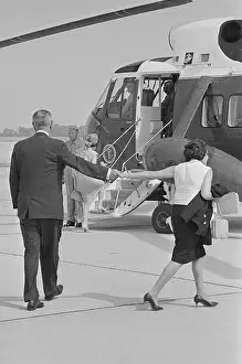 Lyndon and Claudia Johnson Boarding Helicopter