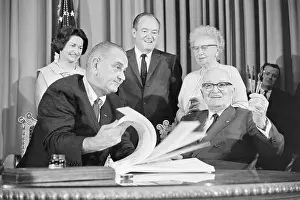 Lyndon Johnson Looking Over Medicare Bill